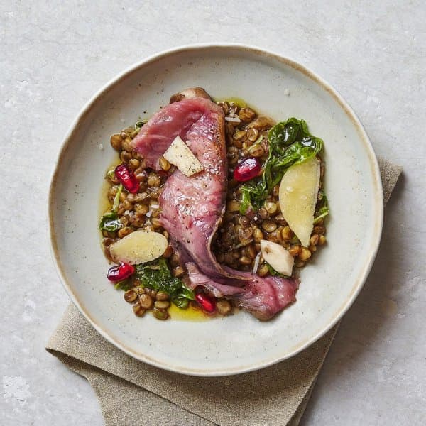 Turmeric-Ginger Lentil Bowl with Seared Beef, Wilted Chard and Pomegranate