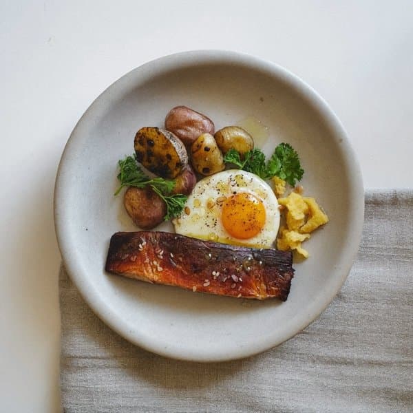 Portuguese Smoked Trout Breakfast with Soft Egg, Crushed Potato and Pimentão