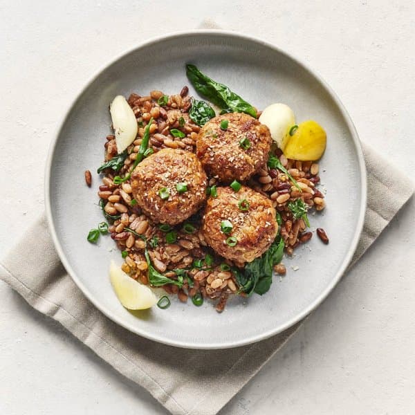 Egyptian Beef Kofta over Cumin-Lentil Koshari with Wilted Spinach