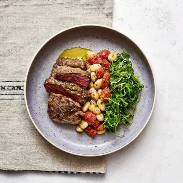 Greek Gigantes Plaki with Seared Beef and Wilted Horta