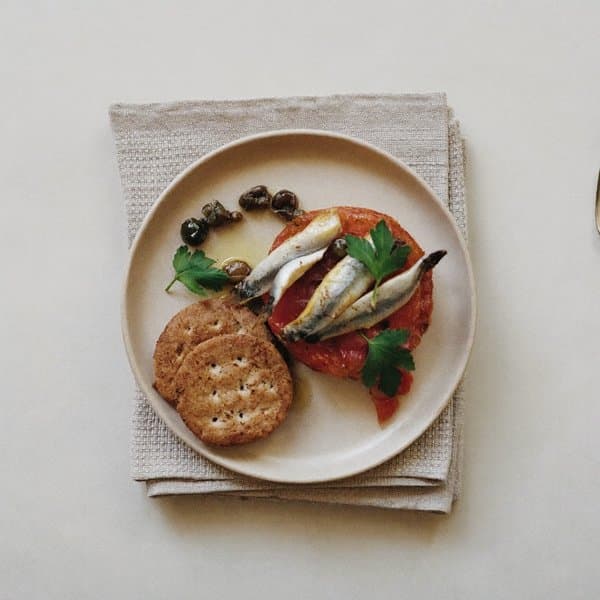 Emilian Sardine and Slow Tomato Bite with Capers and Parsley