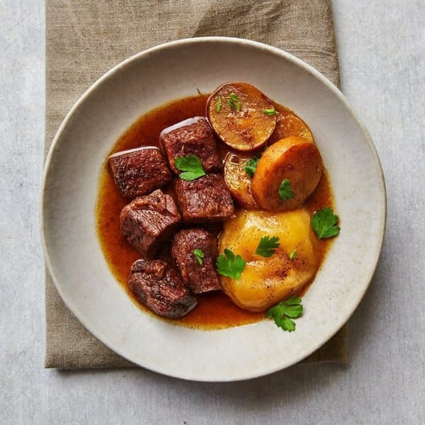 AIP Slow-Braised Beef Chuck with Caramelised Plantain, Warming Spice and Stewed Pear