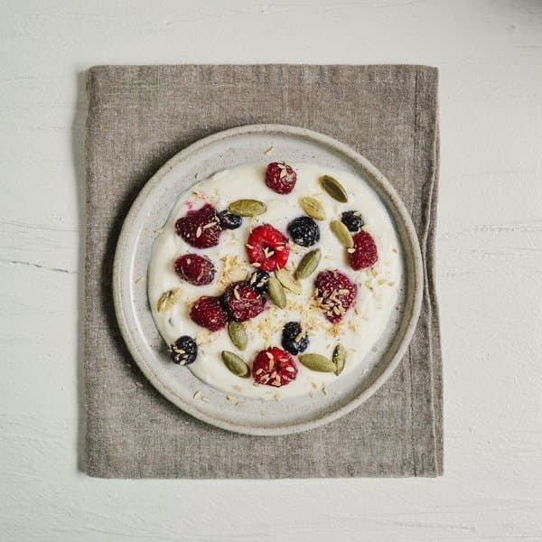 Snack-Size Coconut Yogurt with Berries and Pumpkin Seeds