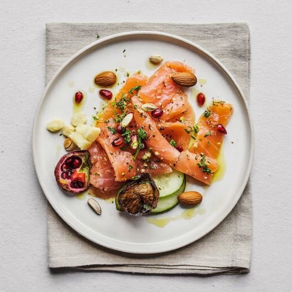 Turmeric-Ginger Smoked Salmon and Brazil Nut Plate with Pomegranate