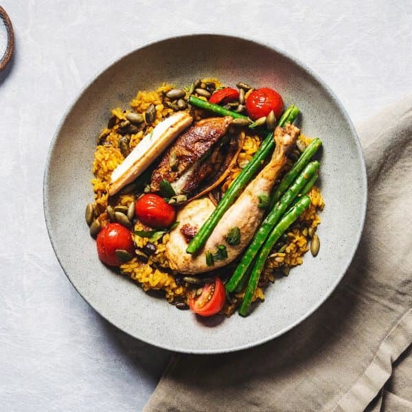 Valencian Paella with Chicken, Rabbit and Pumpkin-Seed Picada