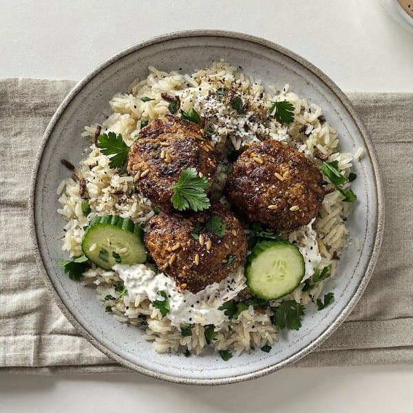 Lebanese Lamb Kofta over Herbed Rice with Cucumber-Tahini Yogurt
