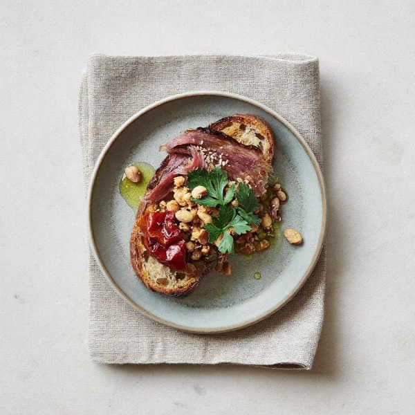 Asturian Tuna Breakfast Bite with Slow Tomato, Brazil Nut and Sidra Vinegar