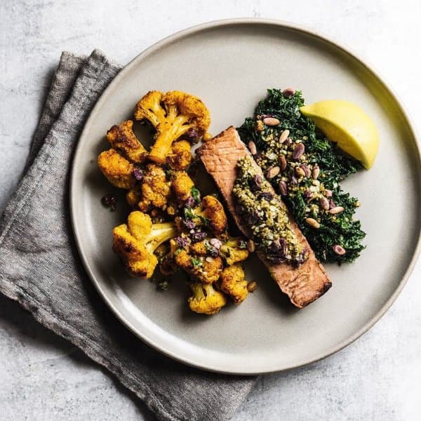 Seared Yellowfin Tuna with Turmeric Cauliflower, Wilted Kale and Brazil-Nut Gremolata