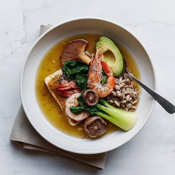 Cod and Shrimp Poached in Ginger-Saffron Broth with Shiitake and Bok Choy