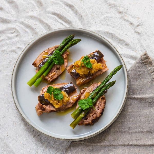Cantabrian Anchovy and Lamb Pintxo with Pumpkin-Seed Picada and Charred Asparagus