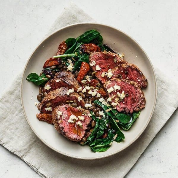 Romagnola Sun-Dried Tomato Beef Skillet with Lentils, Wilted Spinach and Pumpkin Seeds