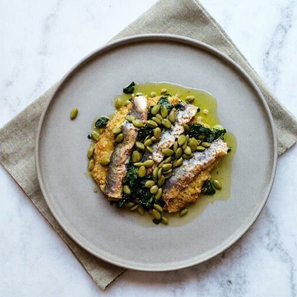 Tuscan Sardine Farinata with Wilted Spinach and Pumpkin-Seed Gremolata