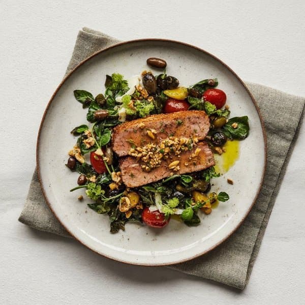 Cretan Yellowfin Tuna over Wild Greens with Brazil Nut, Olive and Oregano