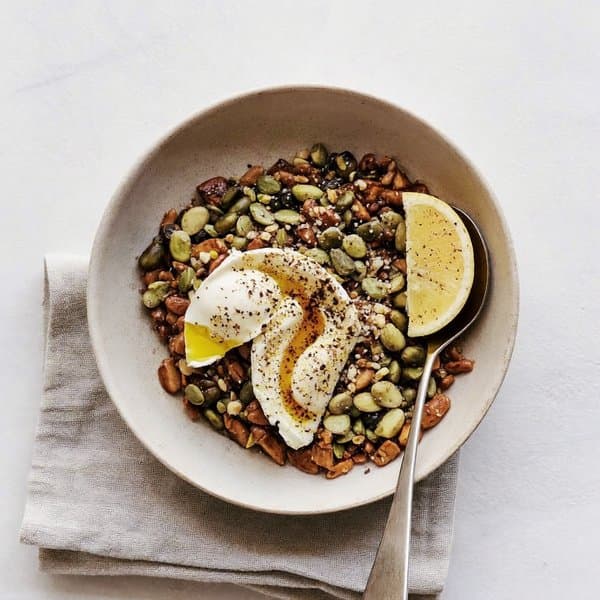 Egyptian Ful Medames Bowl with Soft Egg, Pumpkin Seeds and Lemon