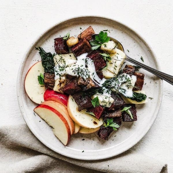 AIP Lamb and Roasted Beet Hash with Wilted Spinach, Apple and Coconut-Lemon Drizzle